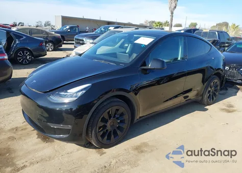 2023 Tesla Model Y Awd/Long Range Dual Motor All-Wheel Drive z USA, uszkodzony, nr VIN 7SAYGDEE1PA025933